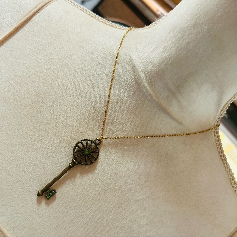 Handcrafted vintage peridot stone skeleton key pendant on chain necklace